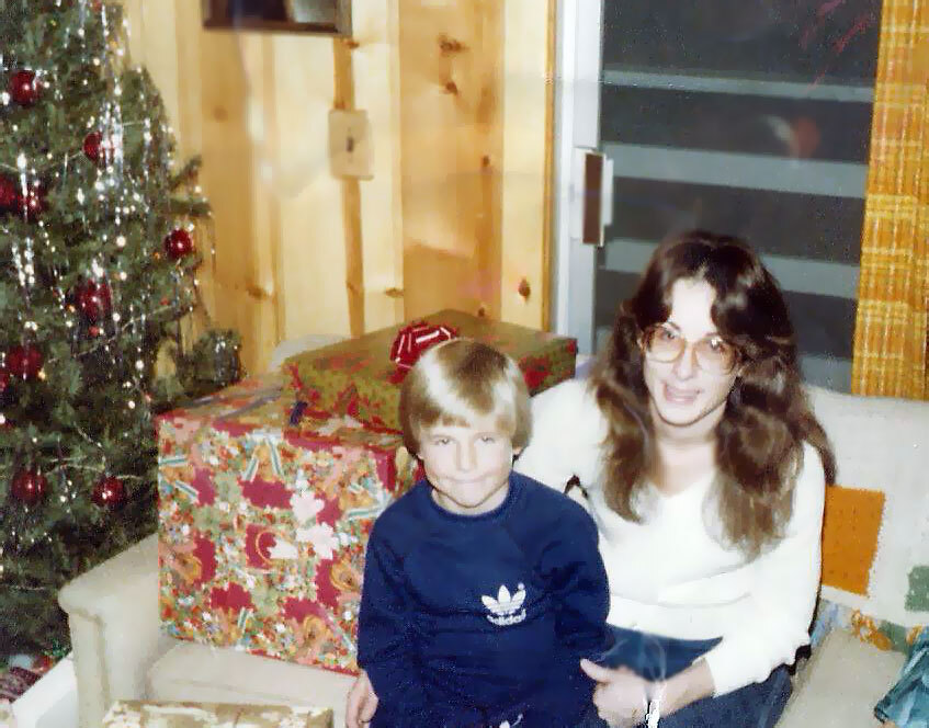 Charles as a child with his mother at Christmas